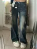 Pantalones de mezclilla estilo patchwork, elegantes y únicos, para mujer, nueva colección primavera/otoño 2026, diseñados para figuras tipo pera, corte holgado, ligeramente acampanados, de pierna ancha