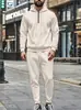 Nova sweatshirt e calça esportiva casual com capuz de waffle de cor sólida para homem, com meio zíper, para outono e inverno, de cross-border da Amazon.