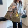 2026 Verano Tendencia Callejera Estampado de Letras Gran Capacidad Bolsa de Viaje Unisex Casual Manual Equipaje Bolsa de Gimnasio