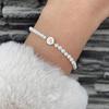 Atacado transfronteiriço pérola artificial comércio exterior feminino pulseira de joia com contas redondas abs letra elástico