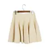 Nuevo conjunto de punto liso de verano para mujer, chaleco corto sin mangas de cuello cuadrado con borde ondulado y conjunto de dos piezas de falda midi de cintura alta