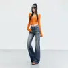 Jeans boca de sino lavado com aspecto desgastado estilo americano resistente, cor Laranja Juvenil, para mulheres, corte slim, estiloso, versátil