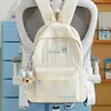 Mochila bordada de color blanco crema en contraste para estudiantes de primaria, mochila nueva y ligera para estudiantes de secundaria, mochila de viaje para viajes cortos