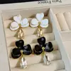 Pendientes de Flor Esmaltada Beige Estilo Vintage con Clavos de Plata para Mujer, Presentando un Ambiente Cortesano de Alta Gama, Lujo Ligero, Diseño Único y Exagerado, Pendientes de Moda