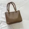 2026 Verano Nueva Moda Retro Personalidad Elegante Casual Texturizado Gran Capacidad Patrón Tejido Bolso de Hombro Único Tote