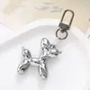 Creativo Nuevo Colgante para Teléfono Móvil Perro Globo de Acrílico Colgante para Llavero de Funda de Teléfono Perro de Dibujos Animados de Moda y Versátil