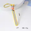 Lindo cortaúñas de dibujos animados en forma de estrella con un limpiador de oídos y lima de uñas, en una paleta de colores cremosos, y diseñado para facilitar su portabilidad