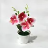 Orquídea artificial de alta gama, minimalista, en maceta, con cuatro flores en una maceta poco profunda, adecuada para la sala de estar, el recibidor o la decoración de escritorio.