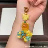 Cera de Abeja de Segunda Generación Varios Estilos Oso Bolsa de Queso Colgante Llavero DIY Exquisito Adorno de Joyería