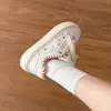 Zapatos de lona súper estilosos, con estampado de estrellas, zapatillas casual versátiles para mujer, nueva colección de otoño 2026, zapatillas blancas de suela gruesa para mujer
