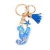 Llavero Colgante Temático Océano Azul con Borla de Estrella de Mar, Llavero de Resina Encanto para Bolso con 26 Letras