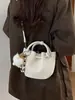 Bolsa de mão vintage de alta qualidade para mulheres, nova moda 2026, bolsa transversal estilosa e versátil, bolsa tipo saco texturizada para o dia a dia