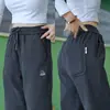 Vendedor Caliente de Douyin Fábrica de Origen Pantalones Casuales de Sarga Tejida Moda Masculina Versátiles Pantalones Deportivos Pantalones de Chándal Hombres Venta al por Mayor
