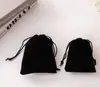 Caja de joyería abatible con cinta caja de libro para anillos collares pulseras embalaje de esponja caja de cartón venta al por mayor