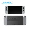Funda Protectora de Cristal Original Dobe para Consola de Juegos Switch Oled, Altamente Transparente y Duradera, con Almacenamiento para Cartuchos