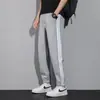 Pantalones deportivos para hombre de cintura elástica para primavera y otoño para el trabajo holgados diarios largos rectos tres rayas pantalones casuales hombre