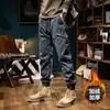 Pantalones de trabajo lavados al agua marca de moda pantalones de chándal desgastados para hombre peso pesado retro casual pantalones para hombre con puños forrados de forro polar pantalones largos de senderismo
