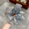 Selección PremiumElásticos elegantes y con estilo, nueva colección de accesorios para el cabello de nicho de alta gama para recoger el cabello en la parte posterior de la cabeza