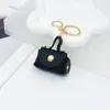 Pingente de bolsa mini em couro moderno estilo coreano, chaveiro, design criativo, disponível em várias cores, acessório de mini porta-moedas