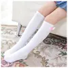 Fabricante Dropshipping Estilo Coreano Medias con Lazo Rayadas Algodón Peinado para Niñas Calcetines Altos Calcetines Infantiles Fabricante Mayorista