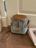 Bolso de cubo tejido transfronterizo, moderno y versátil, nuevo modelo de verano 2026, bolso cruzado de diseño simple de nicho