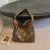 Bolso de Mano con Estampado de Leopardo para Mujer 2026 Nuevo Estilo Moda Retro Bolso de Hombro Único Bolso Tote de Gran Capacidad Nicho Súper Popular Bolso para Viajes