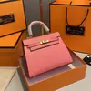 Bolsa Kelly Colorida Mais Vendida no Aliexpress, Bolsa de Mão Feminina Moda Europeia e Americana, Bolsa de Ombro Único Transversal de Alto Padrão para Mulheres