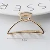Pinza de pelo de metal estilo minimalista con forma de garra, accesorio para el cabello pequeño y mediano, adorno para el pelo coreano para la parte trasera de la cabeza con un toque de alta gama