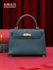 2026 Nuevo Modelo Kl22 Gama Alta Mate Piel de Vientre de Cocodrilo Siamesa Bolso Kelly para Mujer Bolso de Hombro de Piel Genuina