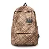 Mochila de cuadros estilo japonés para estudiantes mujeres, gran capacidad, ligera, estilo ins, lindo colgante de peluche, mochila escolar, mochila para el trabajo