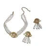 Collar y pulsera de perlas de imitación con flor de diamante francés, cadena de clavícula de nicho de moda, joyería de alta gama que combina con todo.