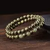 Pulsera de Nanmu Dorado Natural con Accesorios de Ébano y Ágata, Cuentas Budistas de Oración de Alta Gama Unisex