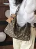 Estilo perezoso bolso pequeño plisado estampado de leopardo para mujer 2026 nuevo bolso de mano retro otoño e invierno sensación de alta gama bolso cruzado con correa ancha