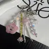 Nueva cadena de teléfono con borlas, accesorio de muñeca para mujer, charm de teléfono de cuentas hecho a mano, moderno y exquisito, un accesorio de funda de teléfono de nicho y lujoso