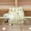 Bolsa Nueva con Cordón Textura de Nicho Hombro Único Cruzada Temperamento Bolso Cubo Moda Retro Francesa Tendencia Bolso para Mujer