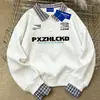 Sudadera Patchwork Minimalista Dos en Uno para Viajes Diarios Unisex Otoño/Invierno Estilo Americano Tendencia Diseño de Cuello Polo Superior