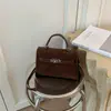 Bolsa de camurça de nicho de outono para mulheres, nova bolsa transversal retrô versátil 2026, bolsa tote Kelly requintada, moderna