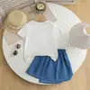 Conjunto de Verano para Niñas 2026 Nuevo Estilo Coreano Moda Camiseta Floral a la Moda y Falda de Mezclilla Conjunto de Dos Piezas