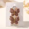 Traje de Pasador de Pelo Tejido a Mano de Lana Europeo y Americano Mariposa Enrollada Pasador de Color Sólido Suave Todo-partido Tocado para Bebé 3841