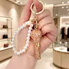 Chaveiro de Microfone 3D com Pedras Strass de Luxo Leve Transfronteiriço Microfone de Strass Super Brilhante Encanto Requintado para Bolsa com Contas de Pérola