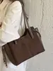 Nuevo estilo de charm para bolso, minimalista y chic, con un toque de elegancia, perfecto para el uso diario, un bolso retro para mujer en otoño e invierno