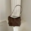 Bolso de nicho de alta gama para mujer, nuevo modelo de invierno 2026, bolso de hombro y axila simple y versátil, bolso cruzado casual para el día a día