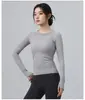 Processamento personalizado, direto da fábrica, suporta pedidos personalizados com base em desenhos e amostras. Top esportivo de manga longa para yoga, esportes e fitness feminino