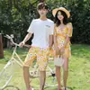 Traje de baño de pareja estampado pequeño fresco de una pieza adelgazante talla grande traje de baño para mujer vacaciones en aguas termales pareja traje de baño para hombre al por mayor