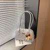 Bolso Pequeño Versátil de Alta Gama Transfronterizo Nuevo Primavera 2026 Bolso de Mujer Bolso de Hombro para Debajo del Brazo Bolso Popular Tipo Almohada