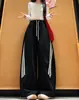 Pantalones deportivos retro americanos de tres rayas para mujer, nuevo estilo otoño 2026, de cintura alta, adelgazantes, holgados, casuales, pantalones de pierna ancha curvada