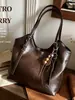 Bolso cruzado de un solo hombro retro de alta gama para mujer 2026 Otoño/Invierno popular textura versátil de gran capacidad