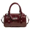 Bolsa de mão de design de nicho transfronteiriça bolsa Boston tipo travesseiro textura de alta qualidade bolsa transversal de ombro moderna