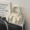 Bolsa Fashionável de Mão Grande Capacidade Estilo Coreano para Mulheres 2025 Primavera Nova Bolsa de Ombro de Nicho Bolsa Cross-Body Bowling