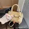 Bolsa Pequena Quadrada Versátil da Moda deste Ano para Mulheres 2026 Nova Bolsa de Ombro Transversal Casual de Comércio Exterior de Alta Qualidade com Textura
